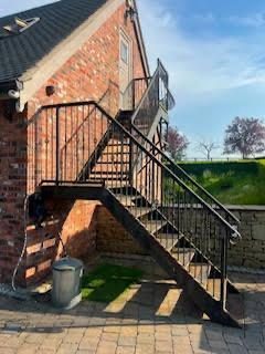 Exterior Staircase Shot Blasting — Rust & Paint Removal